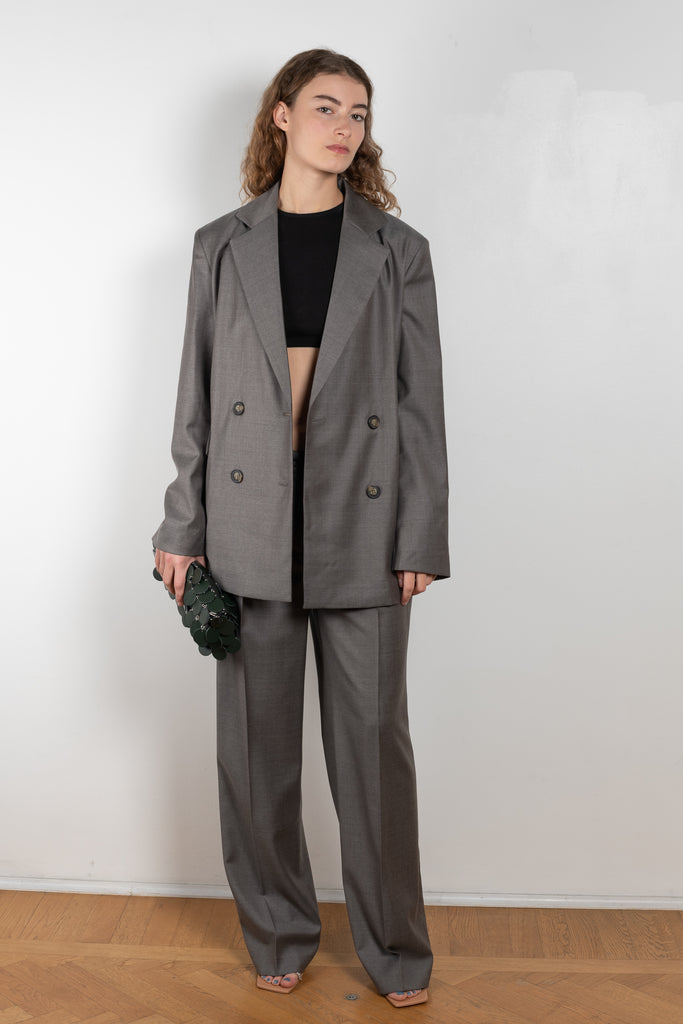 The New Sbiru Pants by Loulou Studio are signature suiting paints that sit on the waist, are ample and pleated at the waist