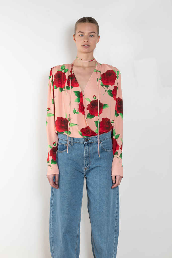 The Flower Blouse 04 is a signature flower printed blouse with a  moderate v neckline and a detachable oversized flower accent on the shoulder