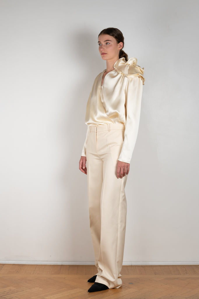 The Wide Leg Pants 08 by Magda Butrum are silk pants tailored with pleating, side pockets, belt loops, and a zip closure