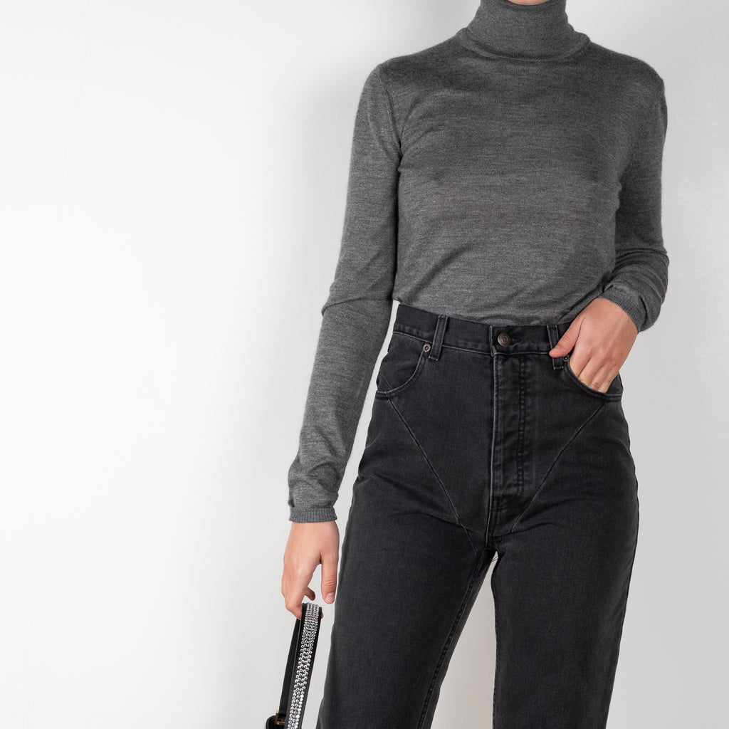 The Stitch Detail Denim is a signature jeans with a  high rise, a straight leg and stitched detailing at the pelvis in front and back to create a unique and feminine shape
