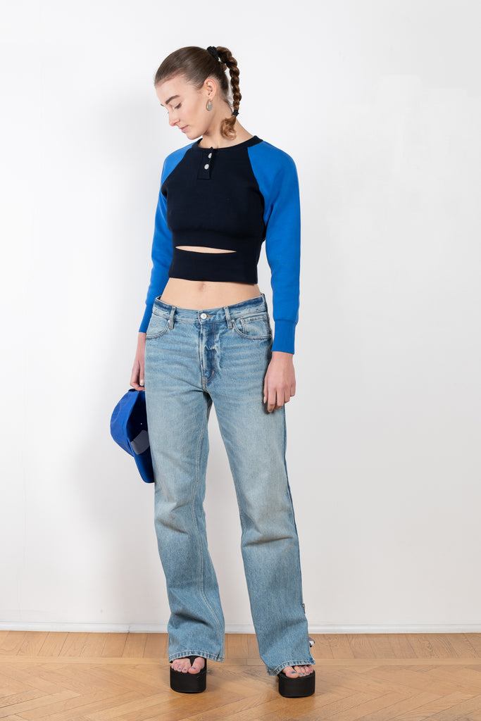 The Baseball Knit by Meryll Rogge is a fitted cropped sweater with a cut-out and baseball details