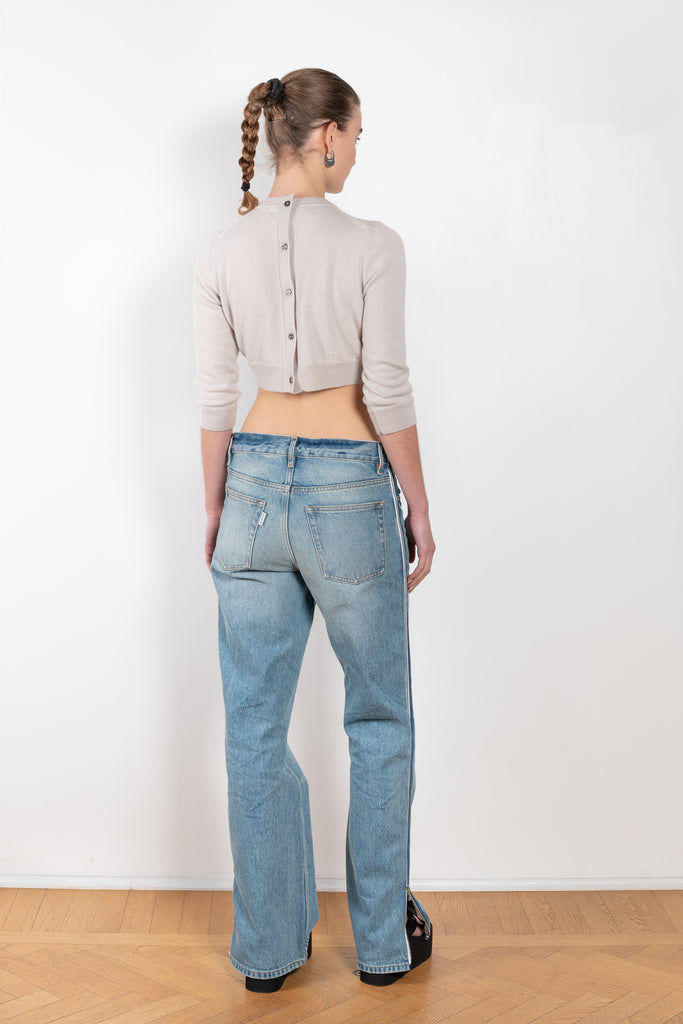 The Cropped Sweater by Meryll Rogge is a cropped cashmere sweater with signature MR details and a buttoned back