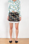 The Slip Skirt by Meryll Rogge is a mini skirt in a seasonal flower print with lingerie slip skirt details