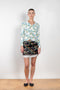The Slip Skirt by Meryll Rogge is a mini skirt in a seasonal flower print with lingerie slip skirt details