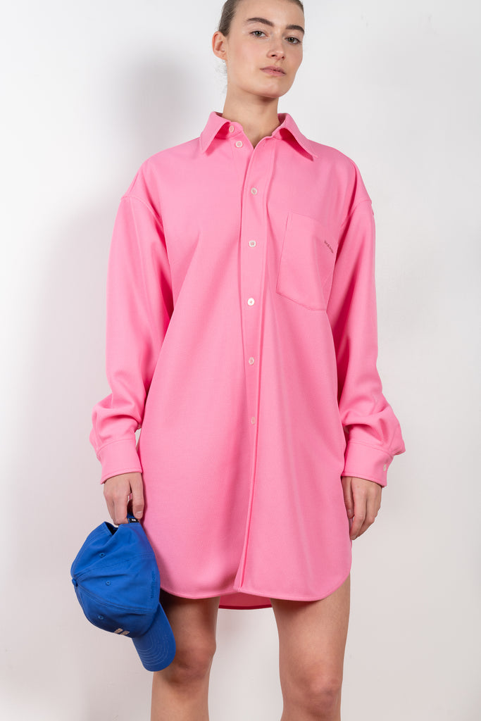 The Shirt Dress by Meryll Rogge is a soft oversized shirt in bright pink with a honeycomb structure