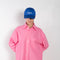 The Shirt Dress by Meryll Rogge is a soft oversized shirt in bright pink with a honeycomb structure