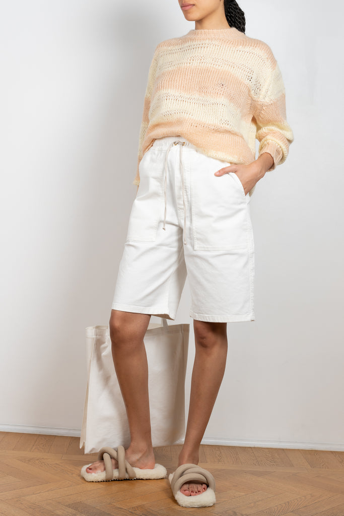 The Hadi Bermuda by Nanushka is a high waisted denim bermuda with vegan leather patch pockets on the back 