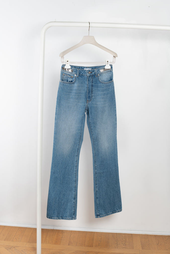 The Embellished Jeans by Paco Rabanne is a straight leg Jeans with embellished discs on the side