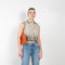 The Floral Shirt by Paco Rabanne is a crisp cotton sleeveless shirt with a floral print and contrasted floral embroidery