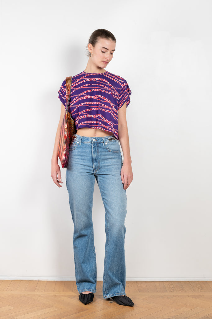 The Jersey Printed Top by Paco Rabanne is a flowy tee with a boxy fit and a seasonal chaint print 