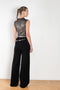 The Knit Chain Pants by Paco Rabanne is a signature knitted trouser with a straight leg and integrated chain belt