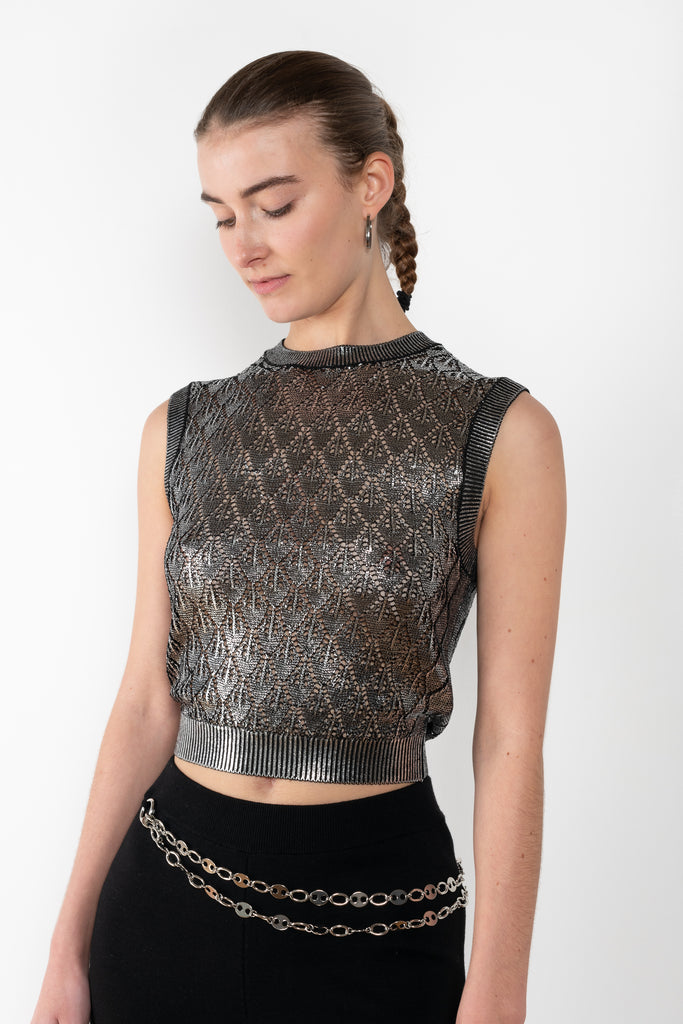The Silver Jacquard Top by Paco Rabanne is a knitted sleeveless jacquard vest top with a silver coating
