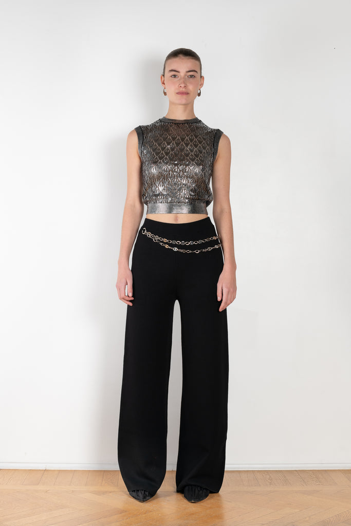 The Silver Jacquard Top by Paco Rabanne is a knitted sleeveless jacquard vest top with a silver coating
