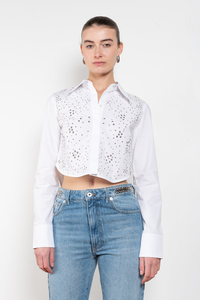 The Studded Shirt by Paco Rabanne is a crisp cotton shirt with a boxy fit and all-over studs