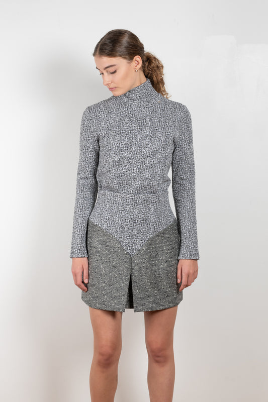 The Wool Top by Paco Rabanne is a structured top in a wool bouclette with a high neck