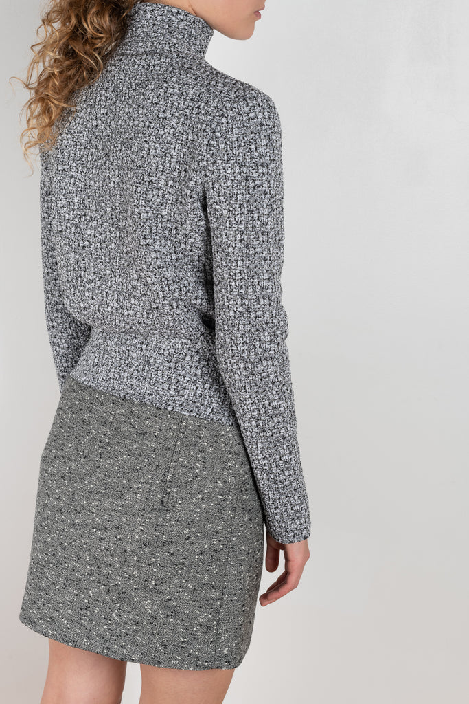 The Grey Wool Skirt by Paco Rabanne is a high waisted mini skirt in a wool bouclette