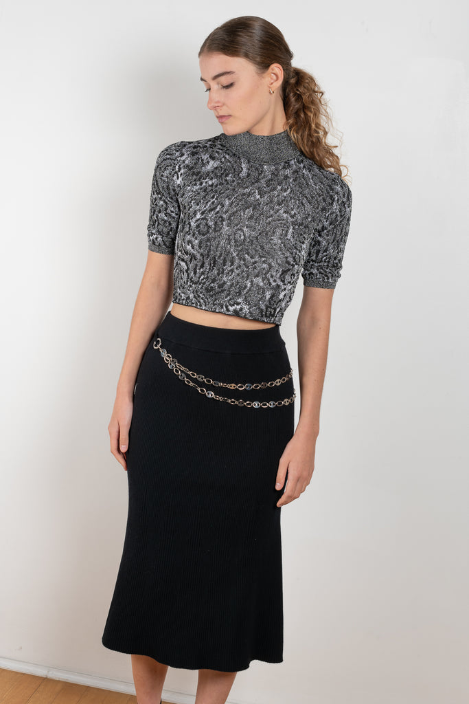 The Wool Chain Skirt by Paco Rabanne is a high waisted midi length skirt with a chain embellished detail