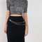 The Wool Chain Skirt by Paco Rabanne is a high waisted midi length skirt with a chain embellished detail