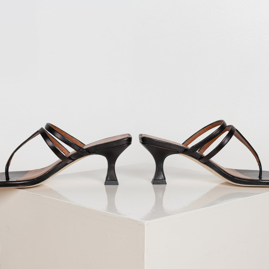 The Allie Sandals by Rejina Pyo are strappy t-bar thong sandals with a uniquely crafted sole
