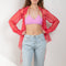 The Ava Bikini Top by Rejina Pyo in bright pink Sakura is a perfect layering piece for all your summer outfits