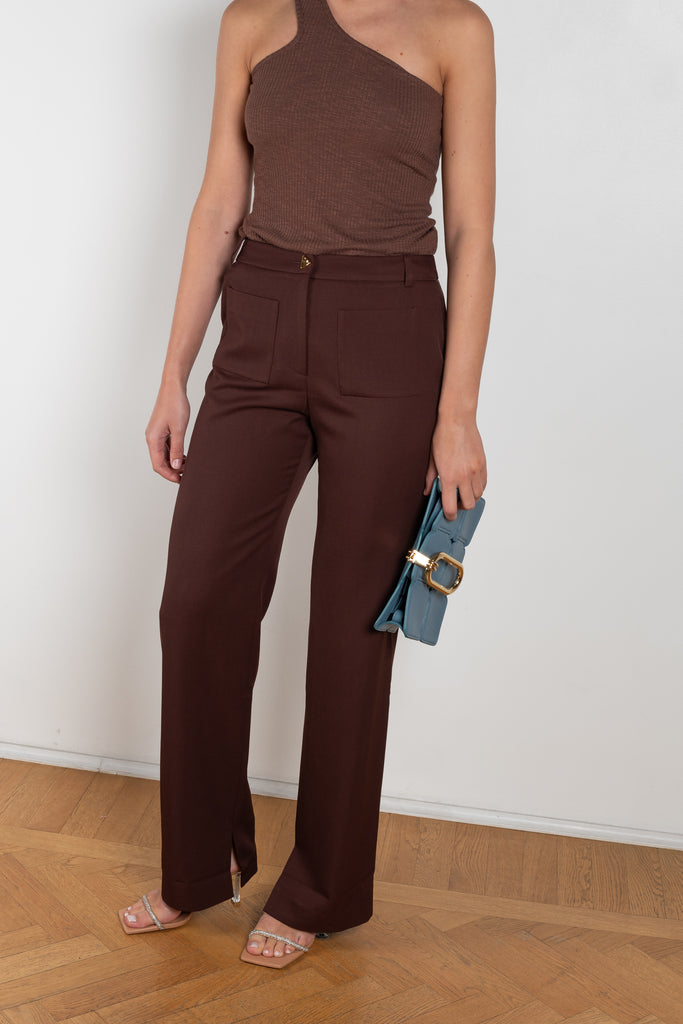 The Ellis Trousers by Rejina Pyo is a high waisted suiting trouser with a straight leg and signature button in a wool twill blend