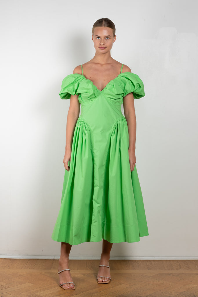 The Erin Dress by Rejina Pyo is an off-the-shoulder dress with puffed sleeves from this Fall's runway