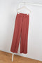 The Laila Trousers by Rejina Pyo are high waisted wide legged trousers with a custom double belt detail