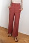 The Laila Trousers by Rejina Pyo are high waisted wide legged trousers with a custom double belt detail