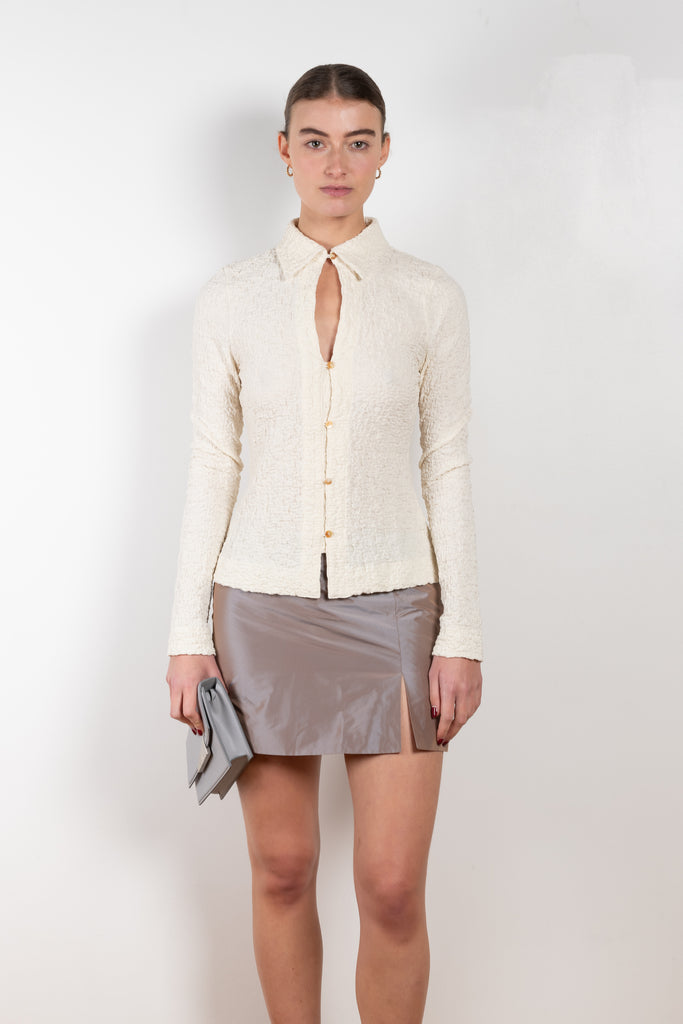The Lowry Top by Rejina Pyo has a fitted stretch silhouette in seersucker and is fastened by pearl buttons at the front
