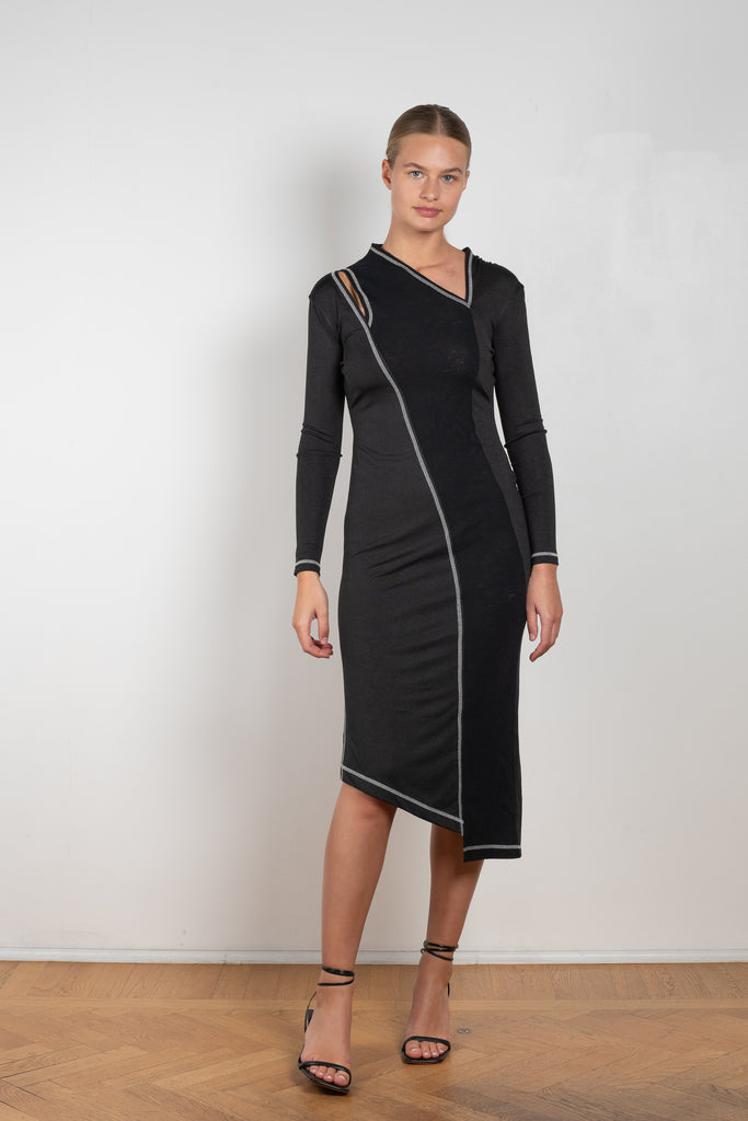 The Mavis Dress by Rejina Pyo is close to the body dress with a shoulder cut-out and contrast stitch detailing