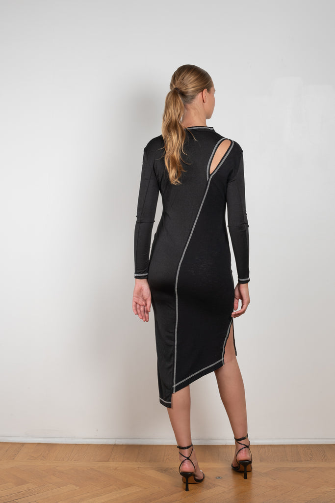 The Mavis Dress by Rejina Pyo is close to the body dress with a shoulder cut-out and contrast stitch detailing