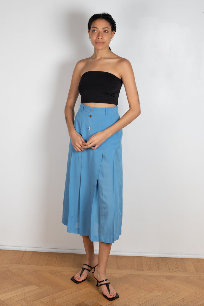 The Miller Skirt by Rejina Pyo is a high waisted pleated skirt with custom made buttons in a bright blue