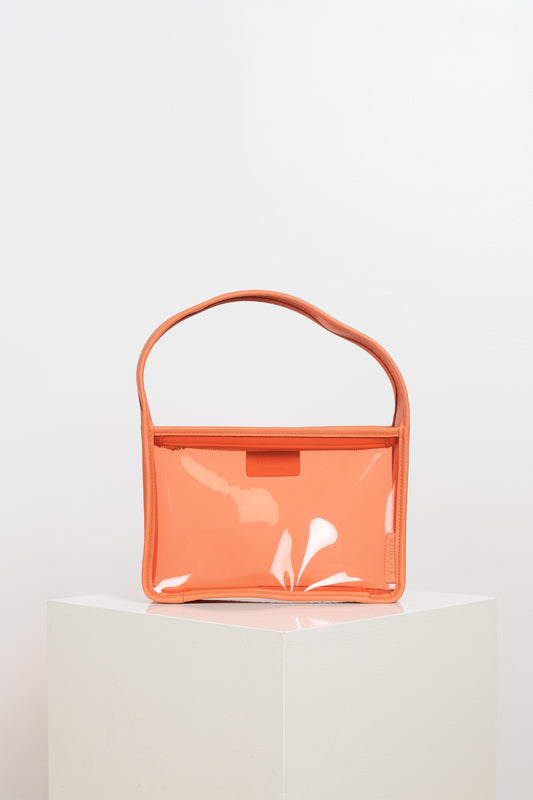 The Mini Lois Bag by Rejina Pyo is a transparent rectangular mini-bag that can carry all your essentials
