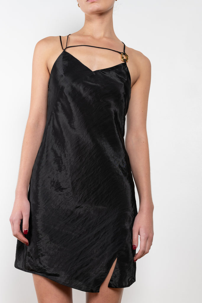 The Sabine Dress by Rejina Pyo is a made in a crinkle viscose blend with an asymmetrical front slit, an adjustable back tie and custom hardware