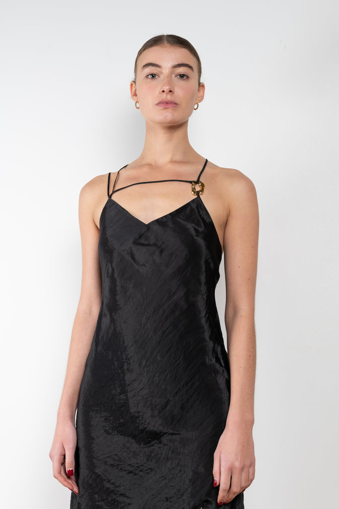 The Sabine Dress by Rejina Pyo is a made in a crinkle viscose blend with an asymmetrical front slit, an adjustable back tie and custom hardware