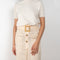 The Tamsin Skirt by Rejina Pyo is a high waisted straight skirt with a buckle belt 