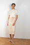 The Tamsin Skirt by Rejina Pyo is a high waisted straight skirt with a buckle belt 