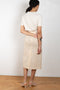 The Tamsin Skirt by Rejina Pyo is a high waisted straight skirt with a buckle belt 