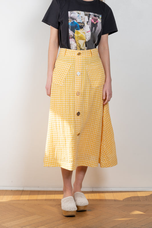 The Rocco Skirt by Rejina Pyo is a mid-length a-line shaped skirt with signature seasonal hand-crafted buttons 
