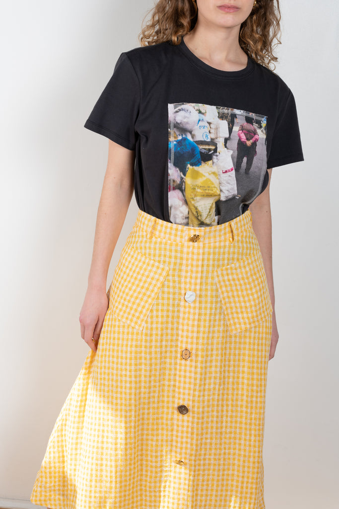 The Rocco Skirt by Rejina Pyo is a mid-length a-line shaped skirt with signature seasonal hand-crafted buttons 