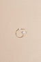 The Claudia Earring by Sophie Bille Brahe is a single hoop earring with pearls, which captures Sophie Bille Brahe’s minimalistic sensibility and clean Scandinavian aesthetic