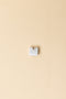 The Croissant Trois Earring by Sophie Bille Brahe is a smaller, delicate earring featuring three diamonds graduating in size which lends perfectly to mix and match other SBB pieces