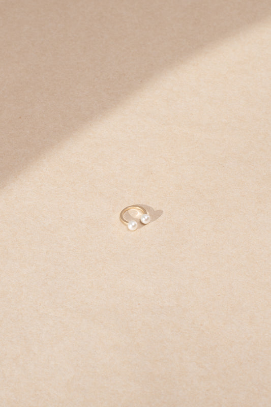 The Emma Deux Earcuff is a delicate 14 Kt Pearl Earcuff which slides over the side of your ear