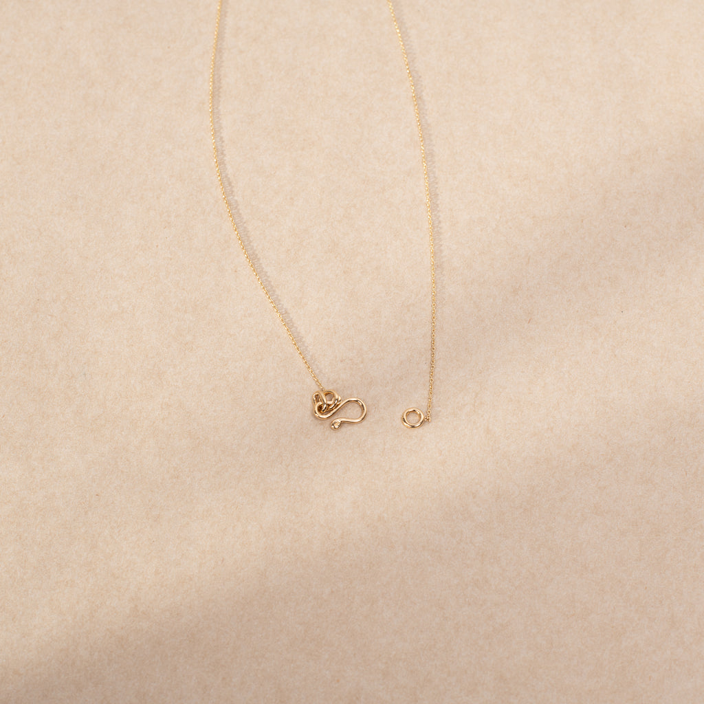 The Fiore Diamant Necklace by Sophie Bille Brahe is a fine Necklace in 18K yellow gold and 0.09 carats of Top Wesselton VVS diamonds in a delicate flower shaped setting