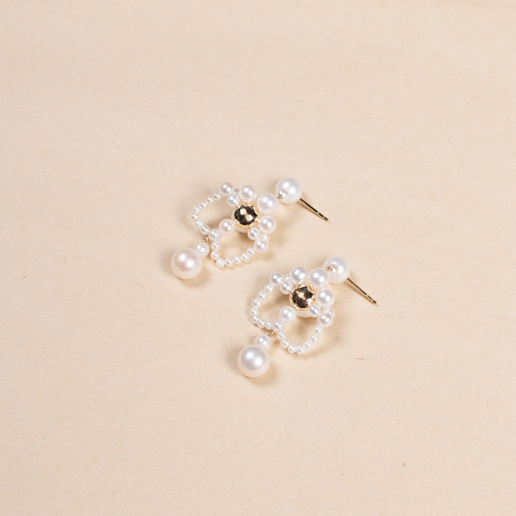 The Grand Chateau de Perles Earrings by Sophie Bille Brahe are a majestic pair of chandelier-style earrings, channelled through Sophie's modern minimalism