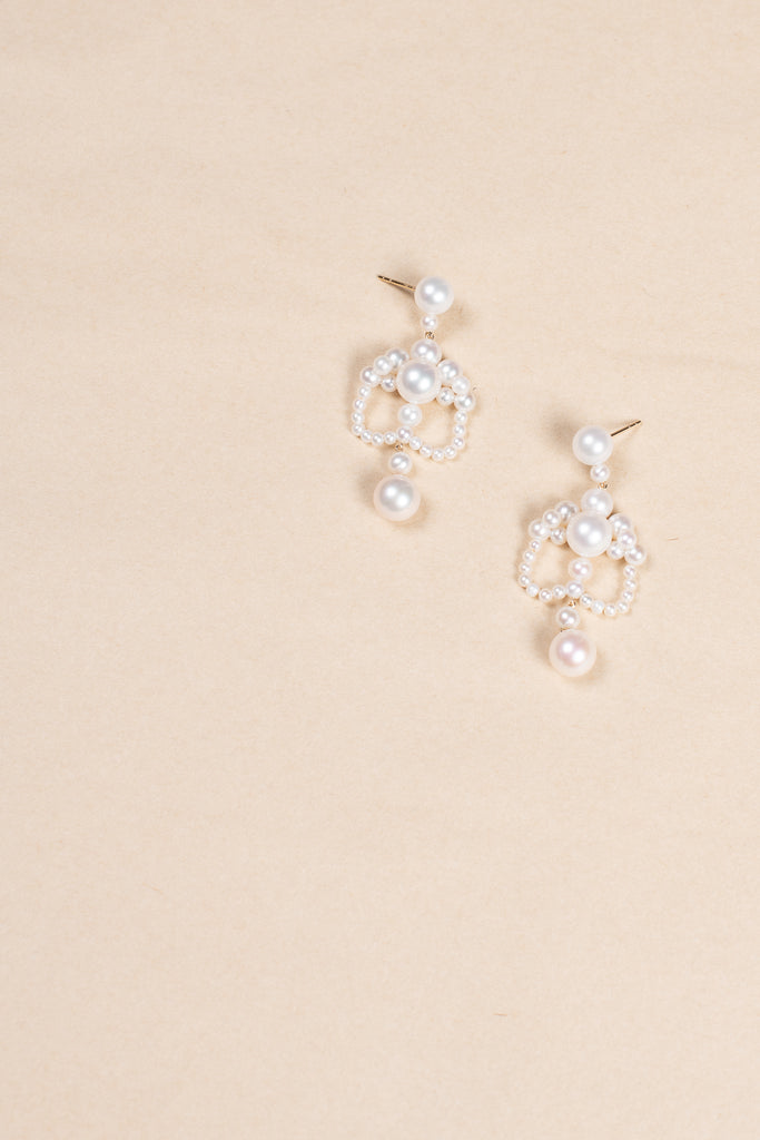 The Grand Chateau de Perles Earrings by Sophie Bille Brahe are a majestic pair of chandelier-style earrings, channelled through Sophie's modern minimalism