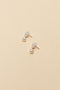 The Margherita Perle Earrings by Sophie Bille Brahe are small 14Kt Gold earrings with freshwater pearls and a single pendant pearl