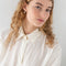 The Margherita Perle Earrings by Sophie Bille Brahe are small 14Kt Gold earrings with freshwater pearls and a single pendant pearl