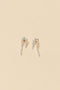 The Petite Perle Nuit Earrings by Sophie Bille Brahe are 14Kt Gold earrings with dropdown freshwater pearls descending in size