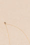 The Conque d'Or Diamant by Sophie Bille Brahe is a delicate Necklace with a Conque pendant in 18K yellow gold with 0,18 ct Top Wesselton VVS diamonds